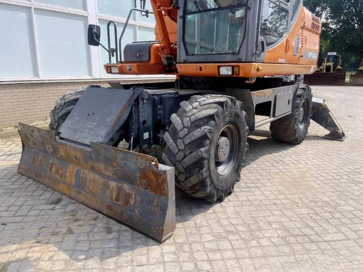 Багер DOOSAN DX 140 W, снимка 17 - Индустриална техника - 46751459