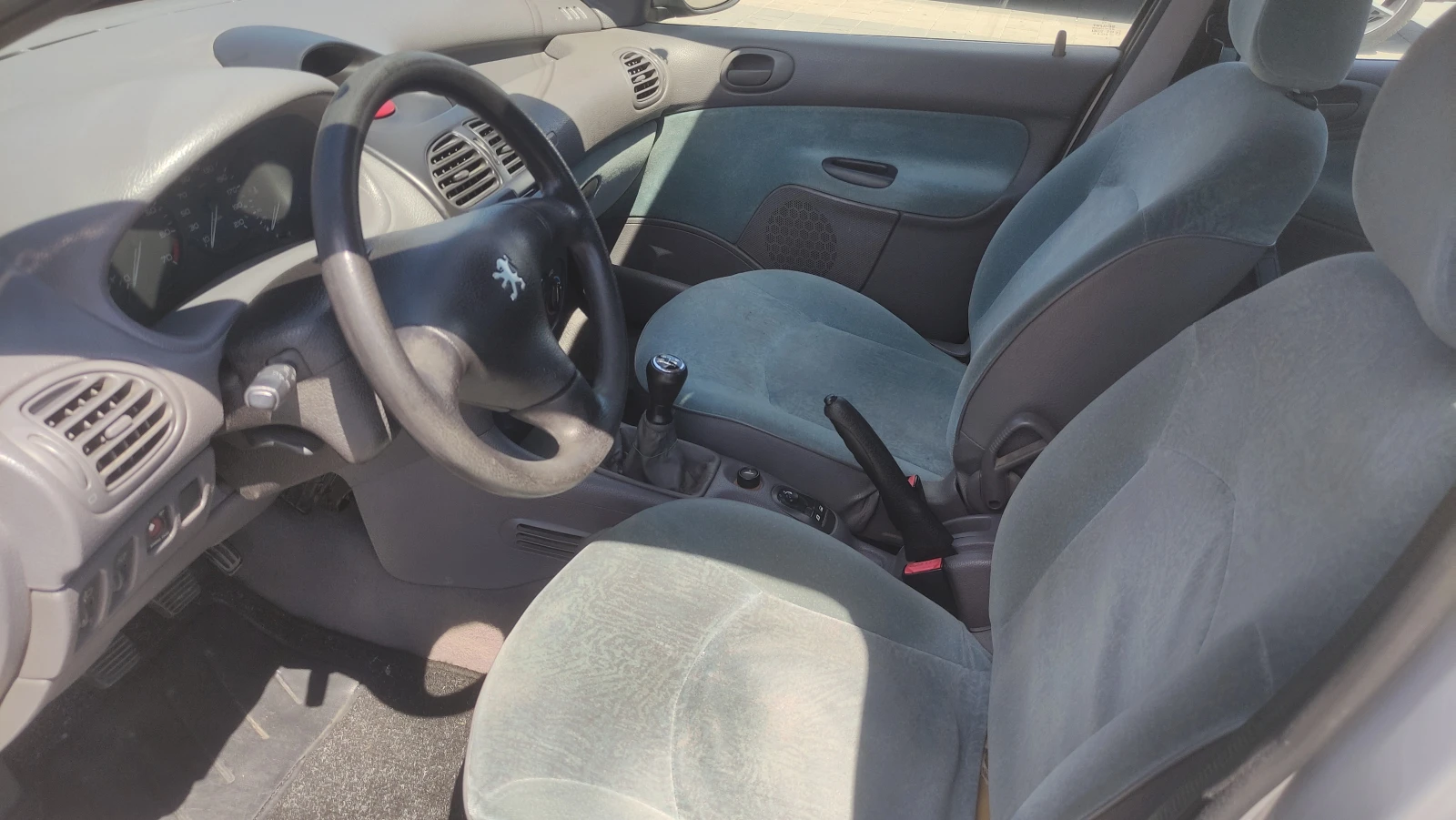 Peugeot 206 1.1 бензин КЛИМАТИК, снимка 13 - Автомобили и джипове - 55080082