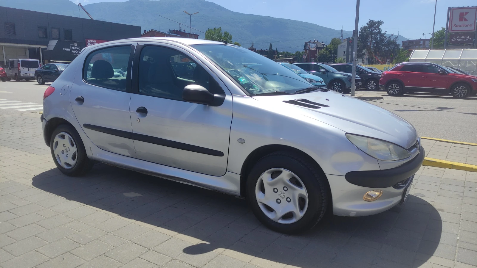 Peugeot 206 1.1 бензин КЛИМАТИК, снимка 8 - Автомобили и джипове - 55080082