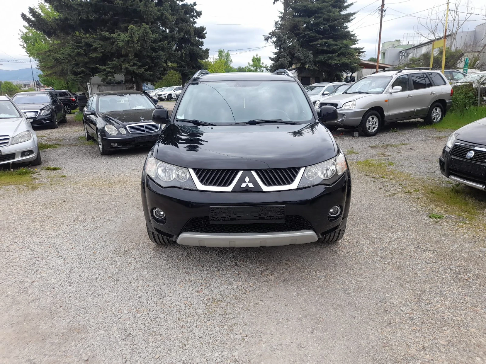 Mitsubishi Outlander 2.4i 4x4 7-места, снимка 2 - Автомобили и джипове - 54483107