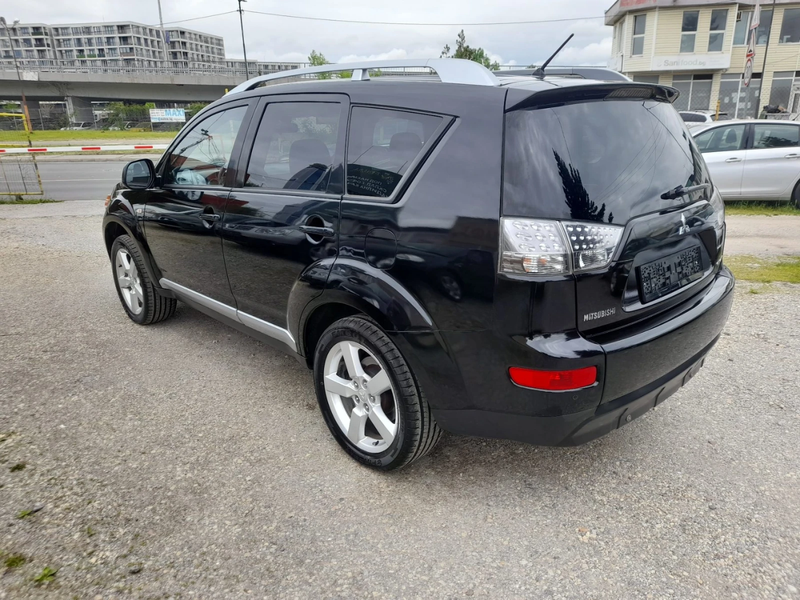 Mitsubishi Outlander 2.4i 4x4 7-места, снимка 6 - Автомобили и джипове - 54483107