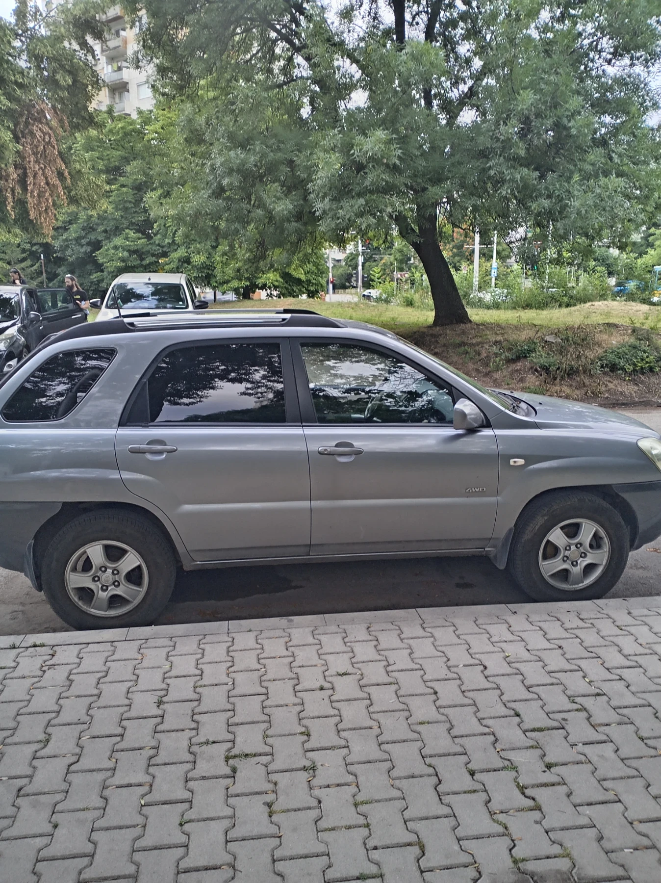 Kia Sportage 2.0 газ-бенин, снимка 2 - Автомобили и джипове - 55161354