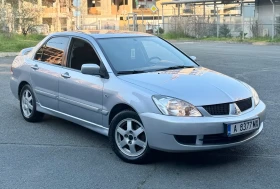 Mitsubishi Lancer 1.6 90к.с 2008г Реални 176хл км!, снимка 1