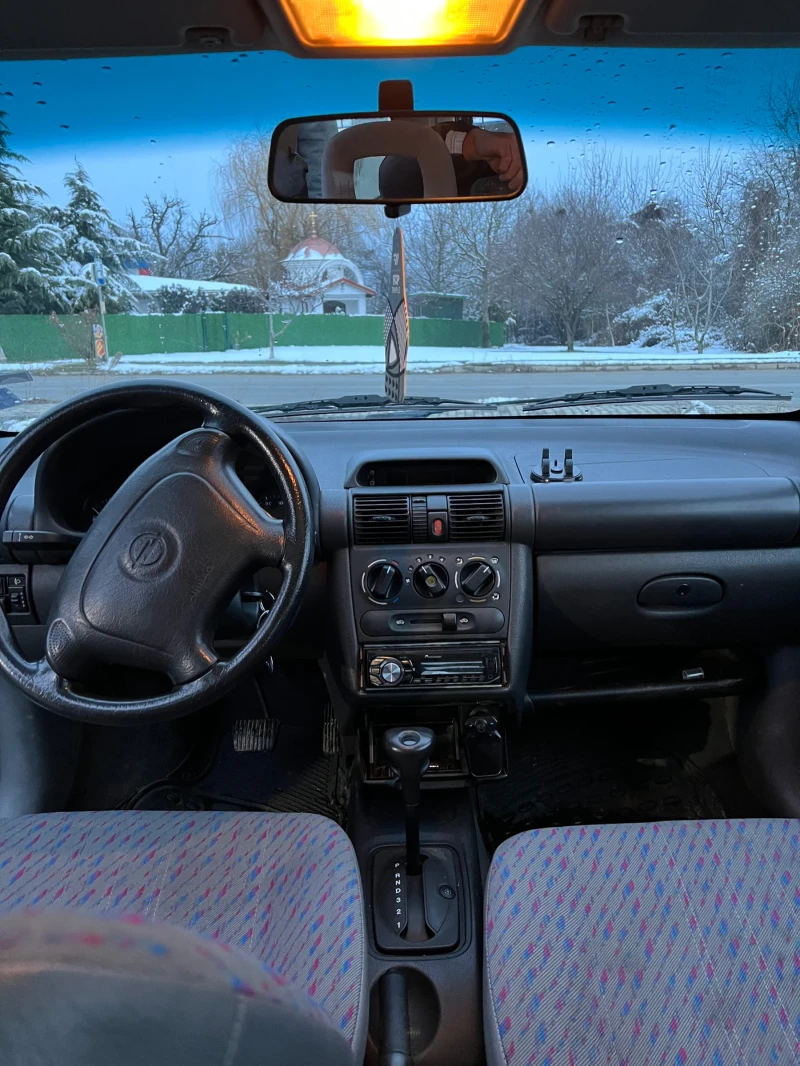 Opel Corsa, снимка 9 - Автомобили и джипове - 48663398