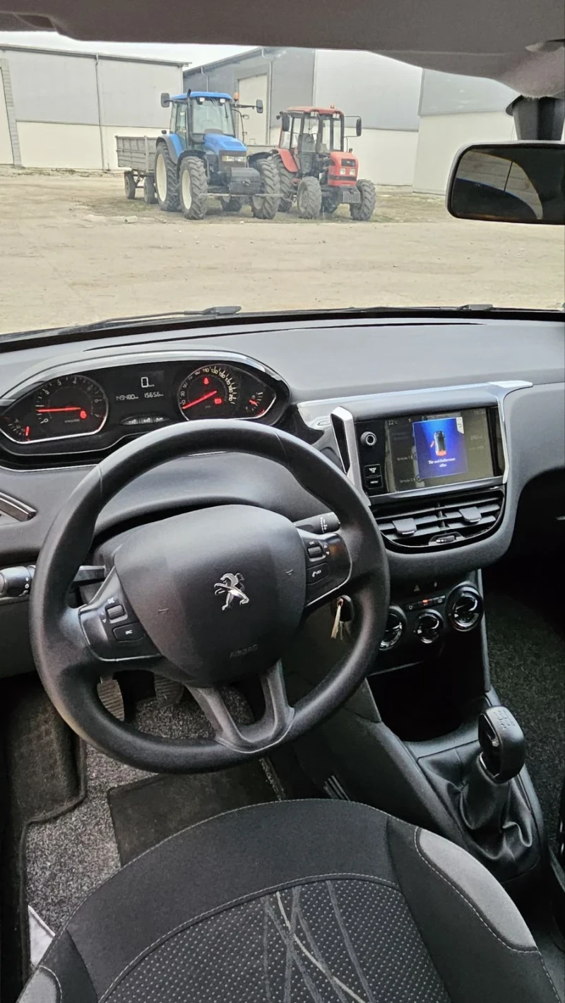 Peugeot 208 1.2-82кс., снимка 13 - Автомобили и джипове - 49535381