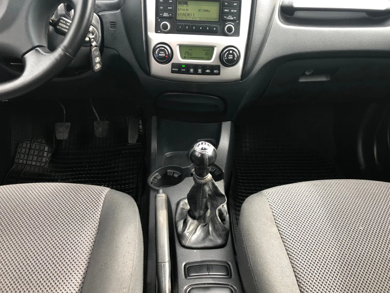 Kia Sportage, снимка 7 - Автомобили и джипове - 44681310