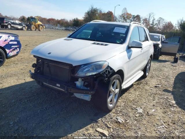Mercedes-Benz GLE 350 4matic* Harman Kardon* Подгреви* Keyless* Самопарк, снимка 2 - Автомобили и джипове - 52650537