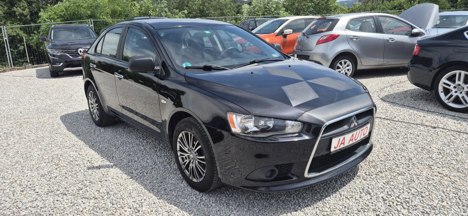 Mitsubishi Lancer 1.5-110кс.КЛИМА - изображение 4