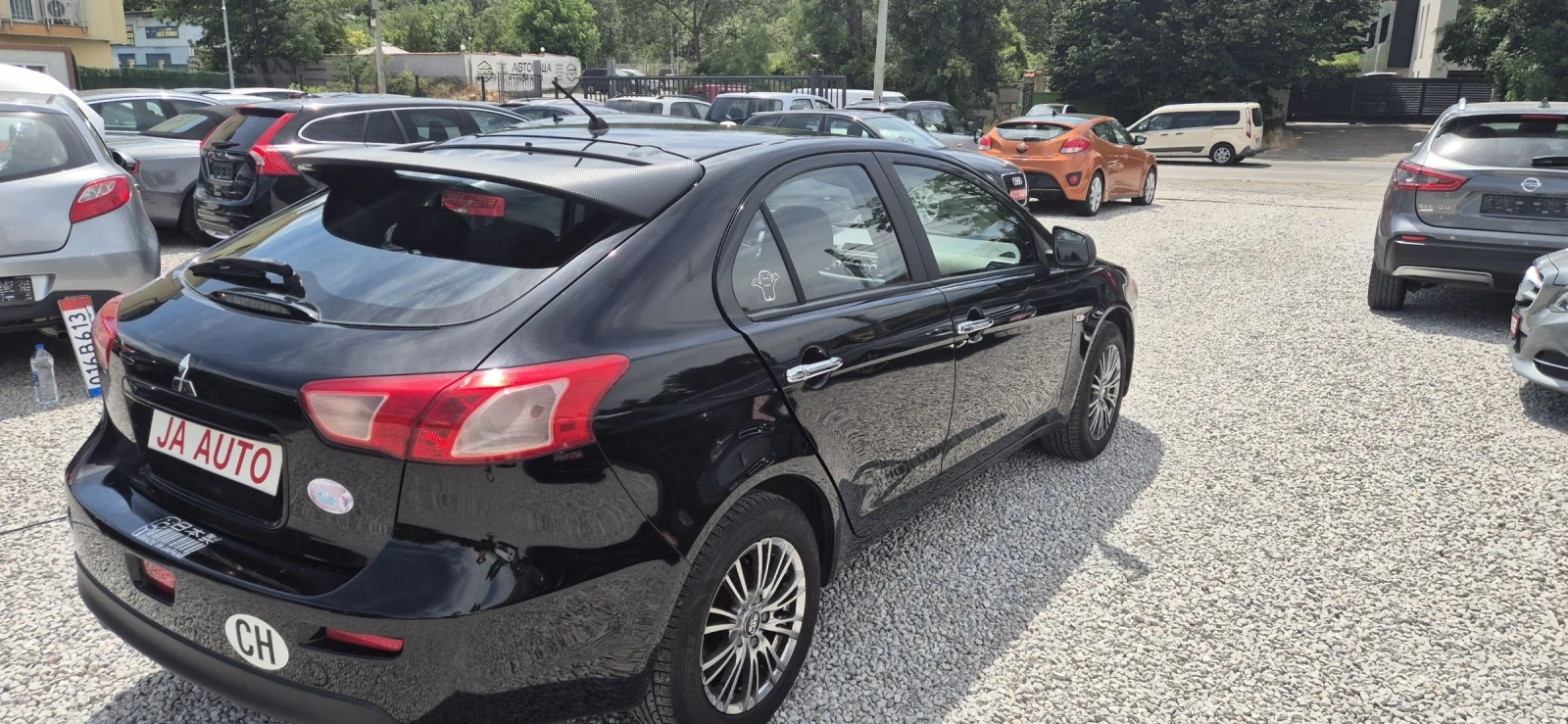 Mitsubishi Lancer 1.5-110кс.КЛИМА - изображение 5