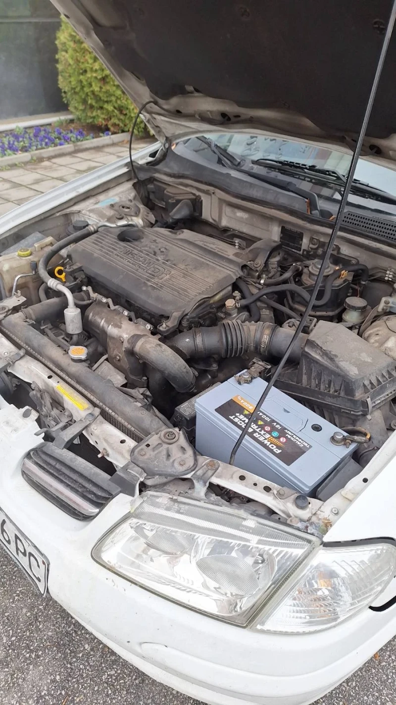 Nissan Almera, снимка 4 - Автомобили и джипове - 52567718