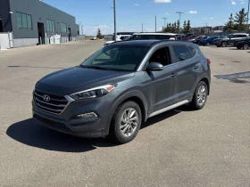 Hyundai Tucson * Luxury * CARFAX * Шибидах * Подгреви * Keyless , снимка 1