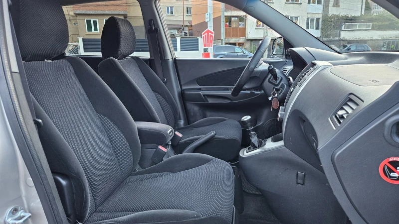 Hyundai Tucson 2.0 Crdi FACELIFT/6skorosti/Klimatik, снимка 13 - Автомобили и джипове - 52129682