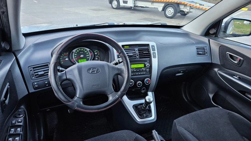 Hyundai Tucson 2.0 Crdi FACELIFT/6skorosti/Klimatik, снимка 10 - Автомобили и джипове - 52129682