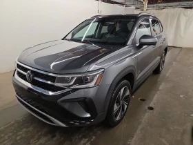 ������ VW Taos