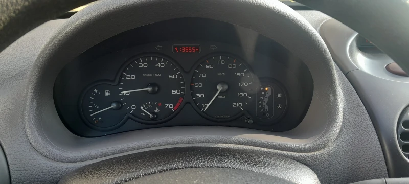 Peugeot 206 1.4, снимка 8 - Автомобили и джипове - 49105410