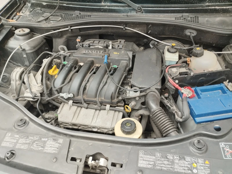 Dacia Duster 1.6i 16v BENZIN , снимка 10 - Автомобили и джипове - 53115183