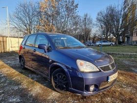 Обява за продажба на Suzuki Liana 1.6 4x4 ГАЗ.ИНЖ ~3 800 лв. - изображение 1