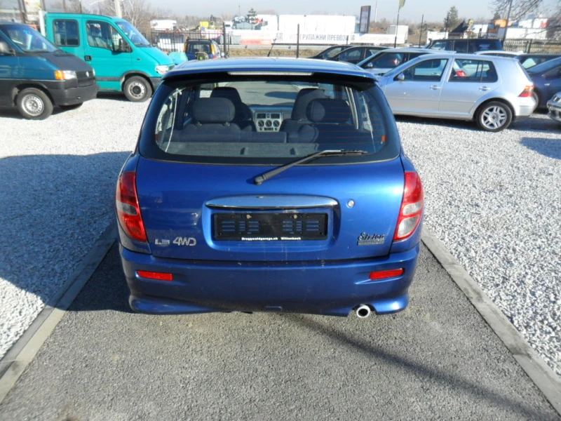 Daihatsu Sirion 1.3i 4x4 AVTOMAT, снимка 4 - Автомобили и джипове - 44066560