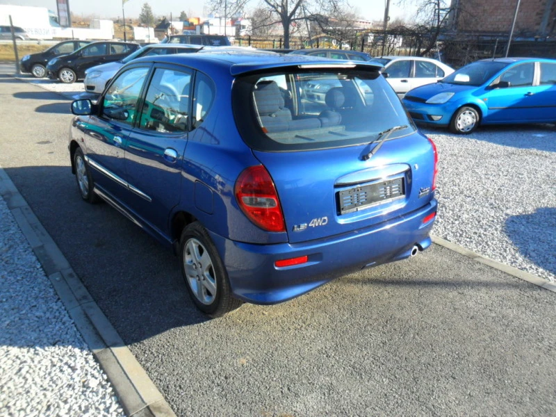 Daihatsu Sirion 1.3i 4x4 AVTOMAT, снимка 5 - Автомобили и джипове - 44066560