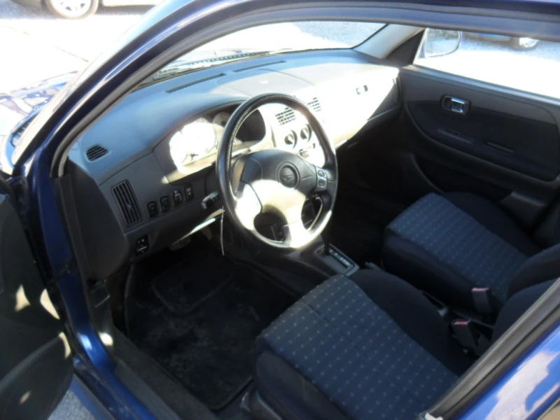 Daihatsu Sirion 1.3i 4x4 AVTOMAT, снимка 7 - Автомобили и джипове - 44066560