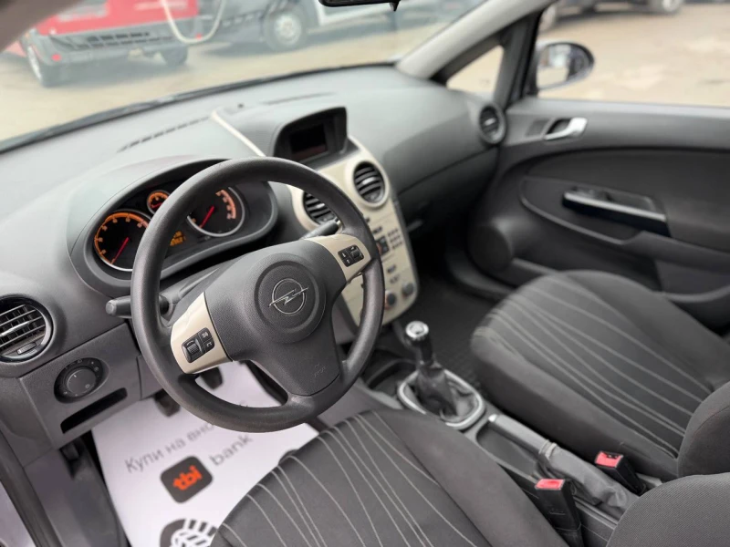 Opel Corsa 1.4i ECOTEC, снимка 10 - Автомобили и джипове - 53056697