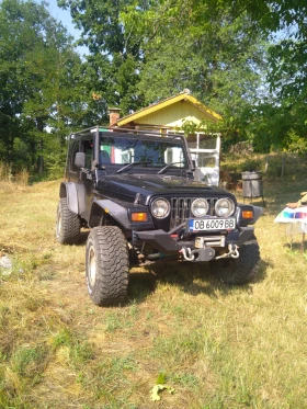 Обява за продажба на Jeep Wrangler ~15 500 лв. - изображение 11 | Auto.bg Обява за продажба на Jeep Wrangler ~15 500 лв. - изображение 11