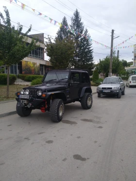 Обява за продажба на Jeep Wrangler ~15 500 лв. - изображение 1 | Auto.bg Обява за продажба на Jeep Wrangler ~15 500 лв. - изображение 1