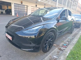 ������ Tesla Model Y