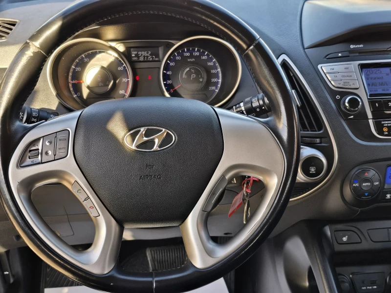 Hyundai IX35 2.0 I 163кс AWD PREMIUM , снимка 11 - Автомобили и джипове - 53113604
