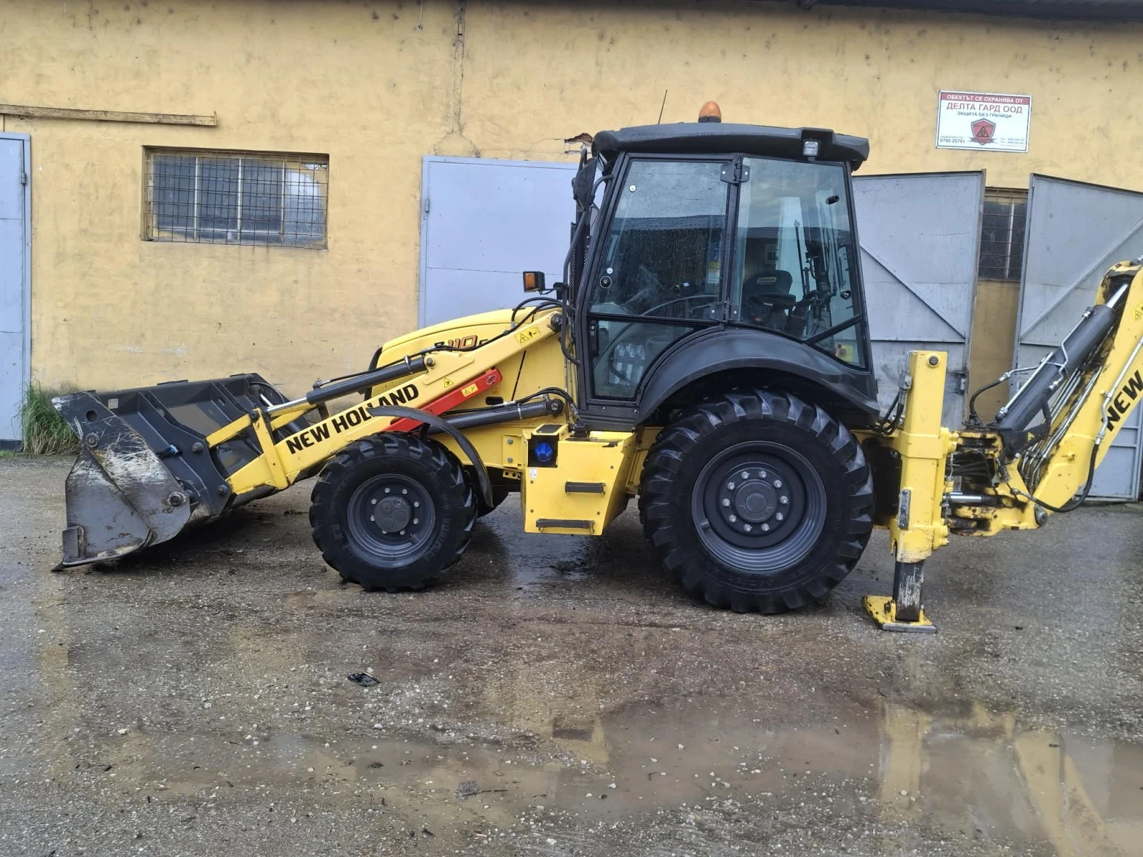 Багер New Holland B110C
