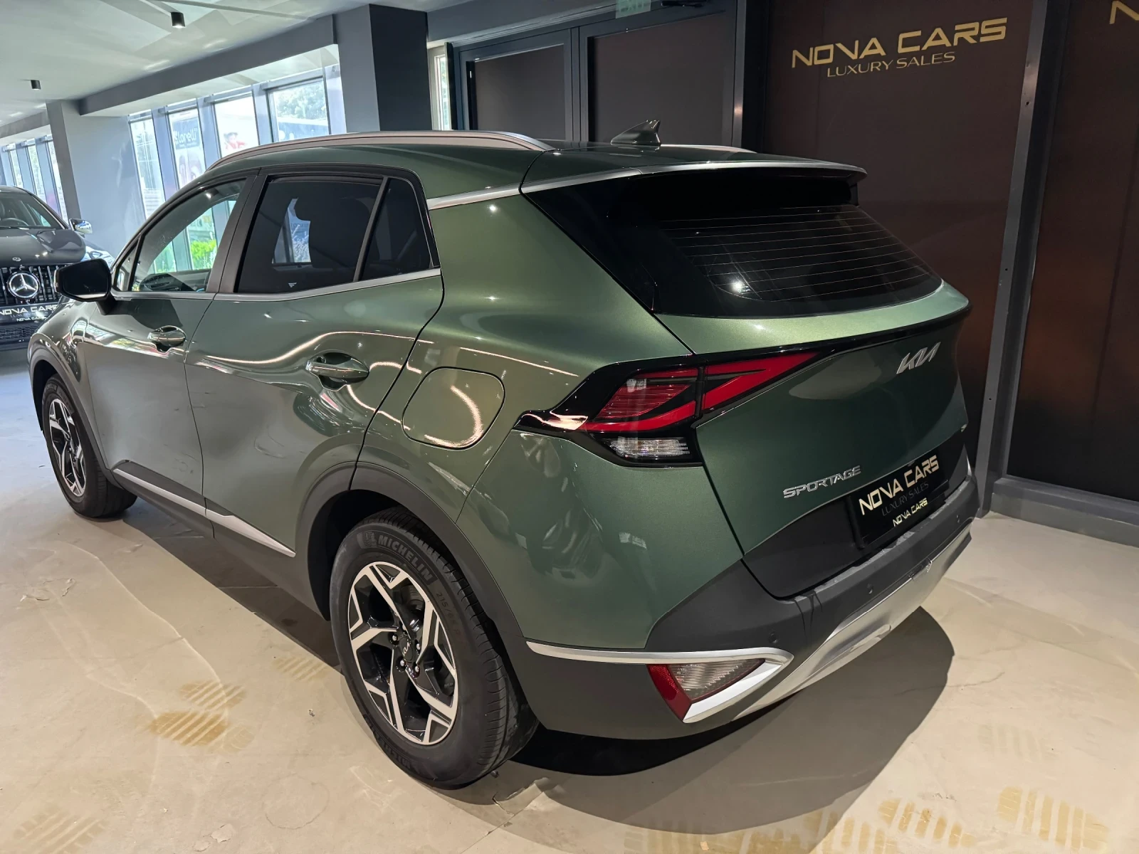 Kia Sportage, снимка 11 - Автомобили и джипове - 54940613
