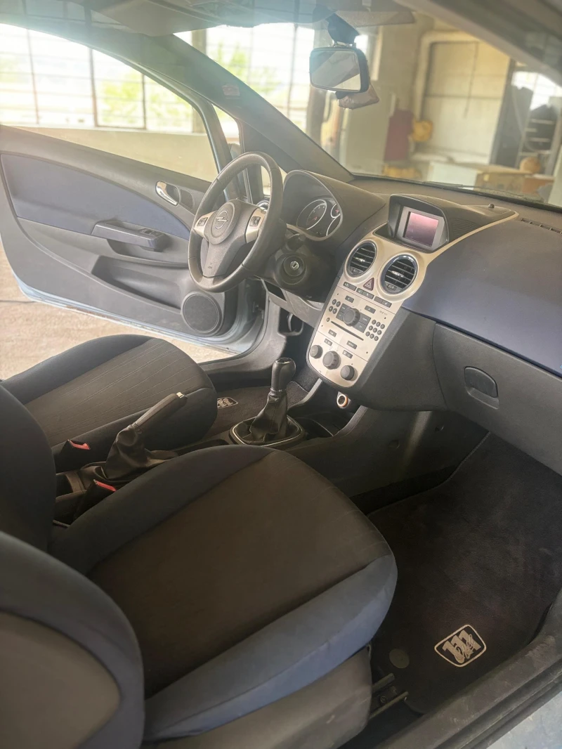 Opel Corsa, снимка 6 - Автомобили и джипове - 47283571