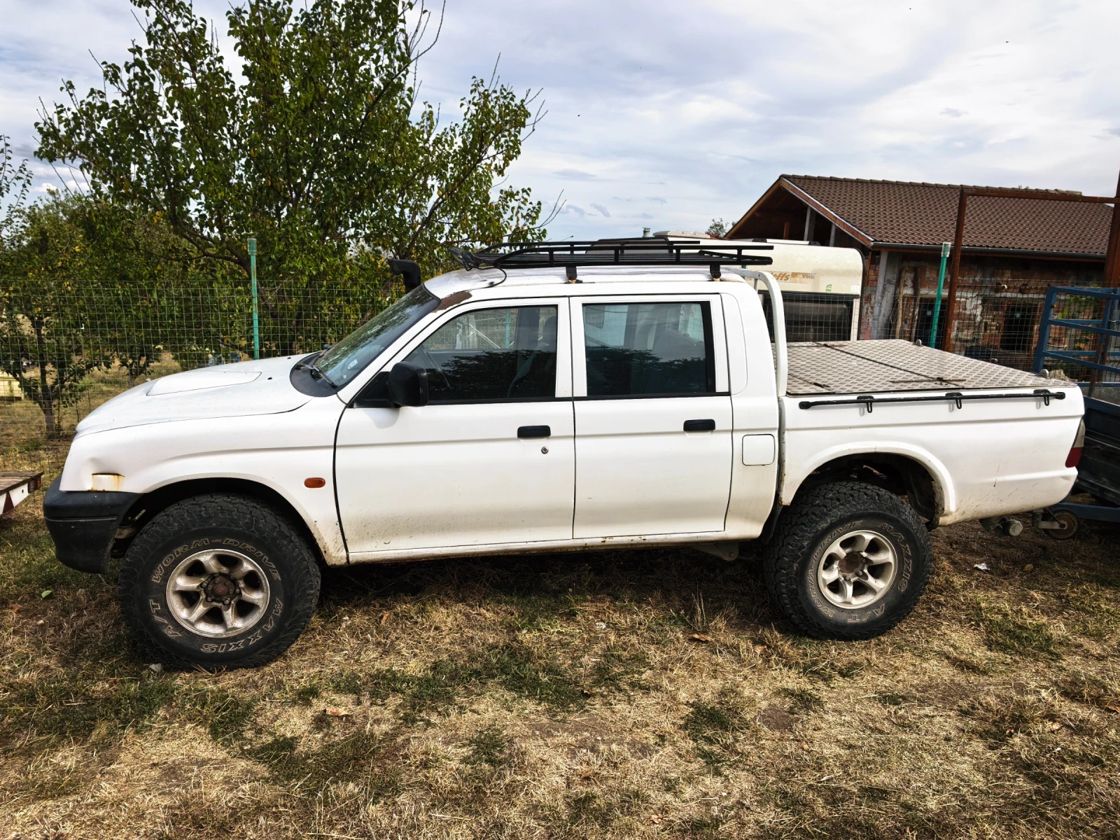 Mitsubishi L200, снимка 2 - Автомобили и джипове - 56485573