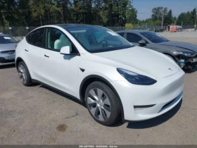 Tesla Model Y AWD/LONG RANGE DUAL MOTOR ALL-WHEEL DRIVE