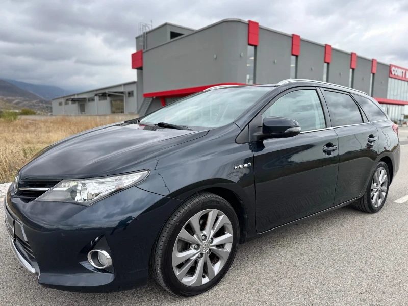 Toyota Auris 1.8 HYBRID / NAVI / CAMERA / LED / KEYLESS, снимка 3 - Автомобили и джипове - 52066241