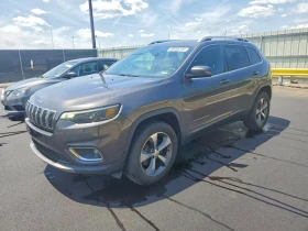 ������ Jeep Cherokee