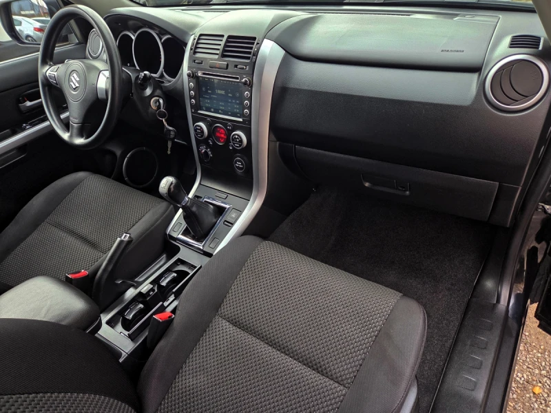 Suzuki Grand vitara 1.9D 129hp 4x4/NAVI/CAMERA, снимка 14 - Автомобили и джипове - 52568671