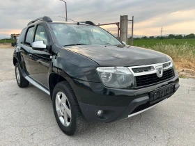     Dacia Duster 16i--105..