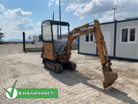 Багер Case CX15