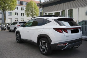 Обява за продажба на Hyundai Tucson PLUG IN* 4WD* KEYLESS* PANO* DISTR* LED* CAM*  ~71 640 лв. - изображение 4