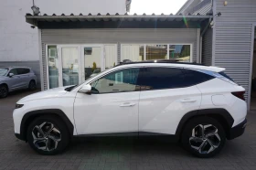 Обява за продажба на Hyundai Tucson PLUG IN* 4WD* KEYLESS* PANO* DISTR* LED* CAM*  ~71 640 лв. - изображение 5