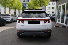 Обява за продажба на Hyundai Tucson PLUG IN* 4WD* KEYLESS* PANO* DISTR* LED* CAM*  ~71 640 лв. - изображение 3