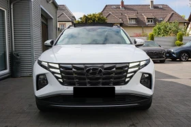 Обява за продажба на Hyundai Tucson PLUG IN* 4WD* KEYLESS* PANO* DISTR* LED* CAM*  ~71 640 лв. - изображение 1