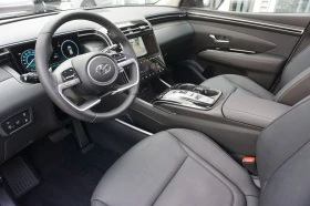 Обява за продажба на Hyundai Tucson PLUG IN* 4WD* KEYLESS* PANO* DISTR* LED* CAM*  ~71 640 лв. - изображение 9