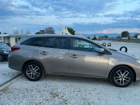 Toyota Auris 1.8Hybrid Lounge 136k.c. 172000км Перфектна!!!, снимка 5