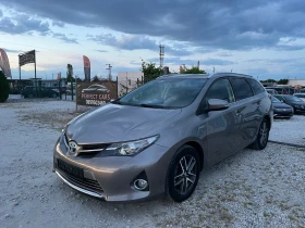 Toyota Auris 1.8Hybrid Lounge 136k.c. 172000км Перфектна!!!, снимка 2