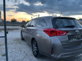 Toyota Auris 1.8Hybrid Lounge 136k.c. 172000км Перфектна!!!, снимка 8
