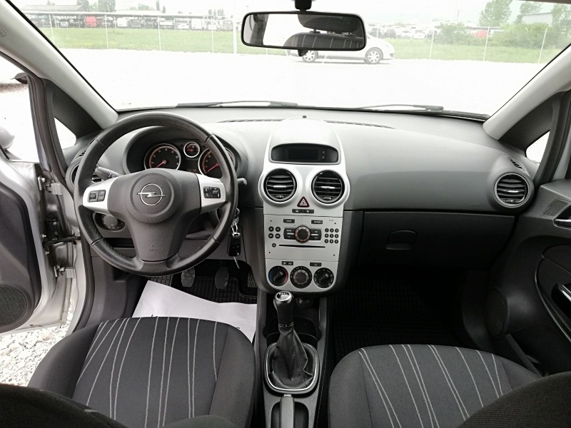 Opel Corsa 1.2i klima, снимка 11 - Автомобили и джипове - 45300894