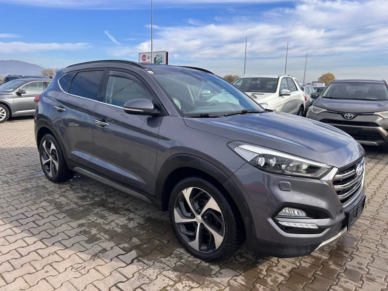 Hyundai Tucson 2.0CRDI 4WD AVTOMAT/NAVI/KAMERA/KOJA/PANORAMA FULL, снимка 4 - Автомобили и джипове - 52404104