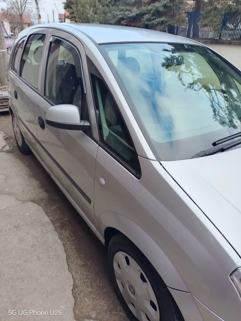 Opel Meriva 1.6i, снимка 9 - Автомобили и джипове - 49168093